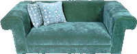 green sofa with pillows